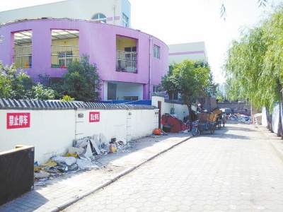 21世紀社區垃圾中轉站與小區世紀先鋒幼兒園僅一墻之隔